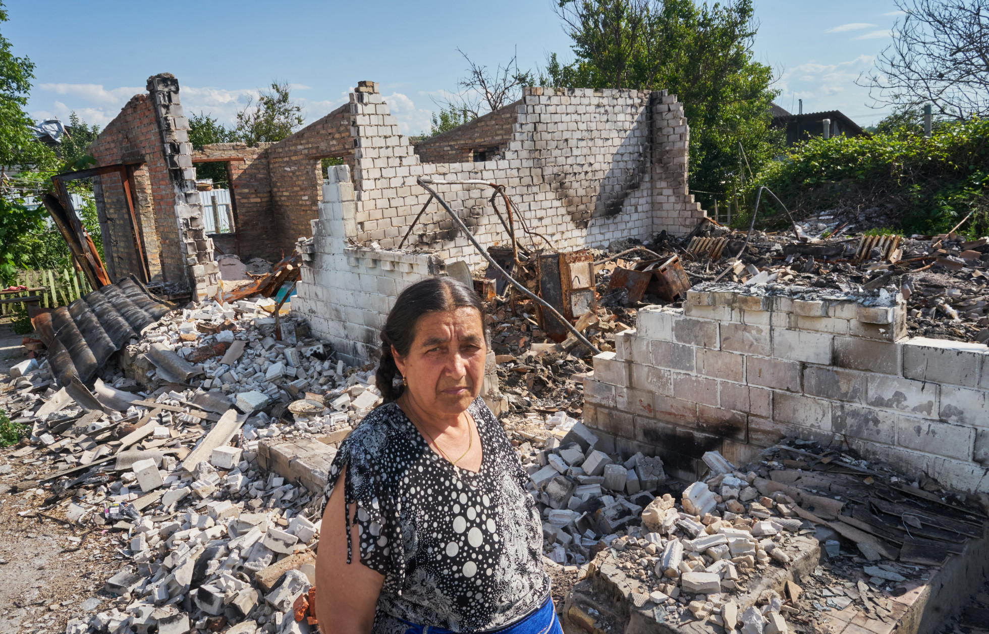 Nastasia Balanova: " I left on the fifth of March, on the sixth of March neighbours called us that our house had burned down. They sent us a video. I arrived back at the end of April. For now I live with my neighbour. In this house my son lived and my grandchild. My son lives in a barn. No one gave us anything, many came to tell us we helped. But nobody helps us yet. If they give at least brics.